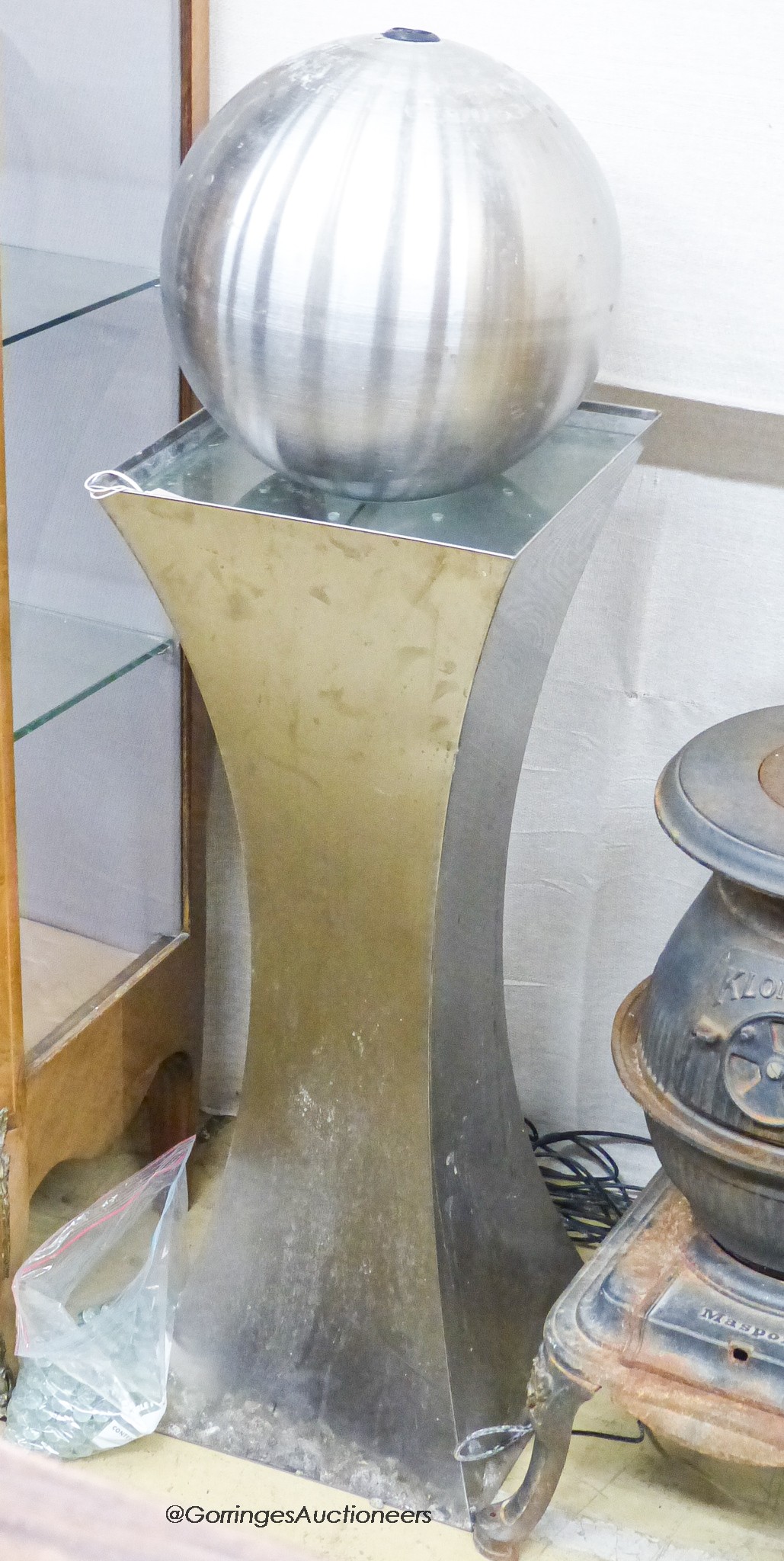 A modern metal garden fountain, H.120cm